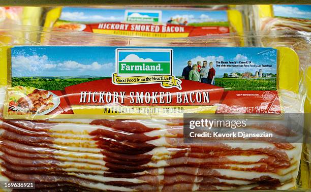 Farmland's hickory smoked bacon is on sale at a supermarket on May 29, 2013 in Los Angeles, California. Farmland is a brand owned by Smithfield Foods...