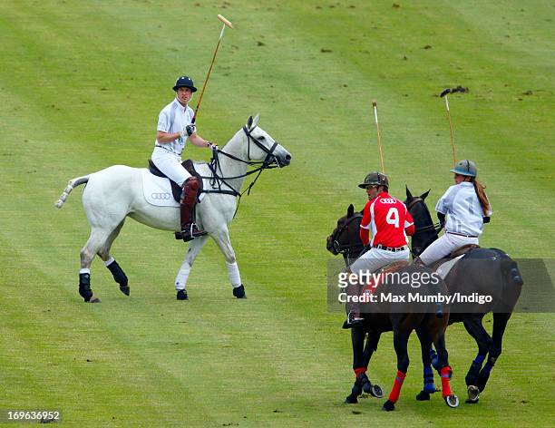 Prince William, Duke of Cambridge plays in the Audi Polo Challenge at Chester Racecourse on May 29, 2013 in Chester, England.