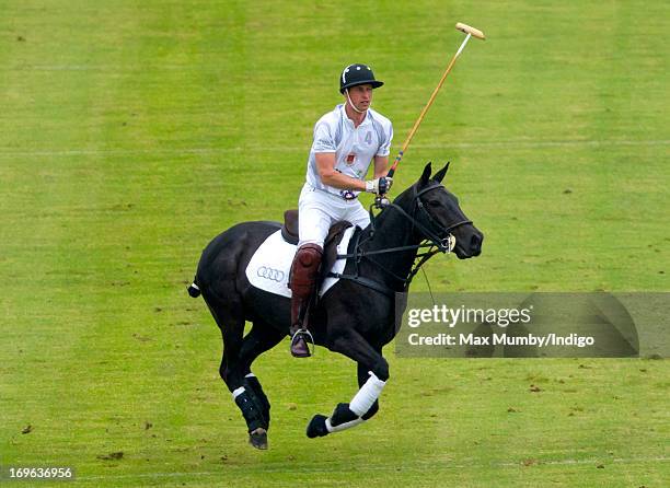 Prince William, Duke of Cambridge plays in the Audi Polo Challenge at Chester Racecourse on May 29, 2013 in Chester, England.