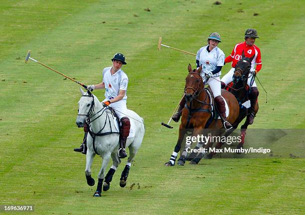Prince William, Duke of Cambridge plays in the Audi Polo Challenge at Chester Racecourse on May 29, 2013 in Chester, England.
