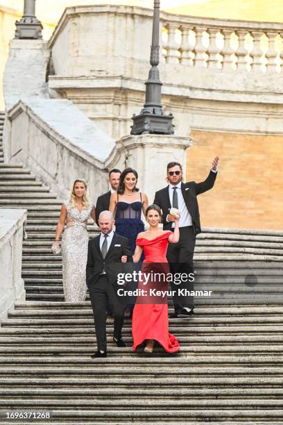 Team players Sam Burns, his wife Caroline Campbell, Brian Harman, his wife Kelly Van Slyke and Wyndham Clark and his partner Julia Kemmling arrive...