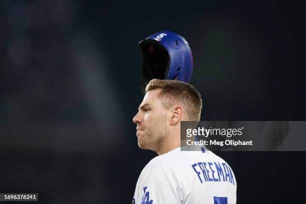 Freddie Freeman of the Los Angeles Dodgers reacts after recording his 200th hit of the season during the first inning against the San Francisco...