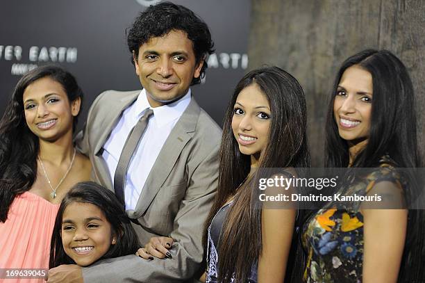 Director M. Night Shyamalan and family attend the "After Earth" premiere at the Ziegfeld Theater on May 29, 2013 in New York City.