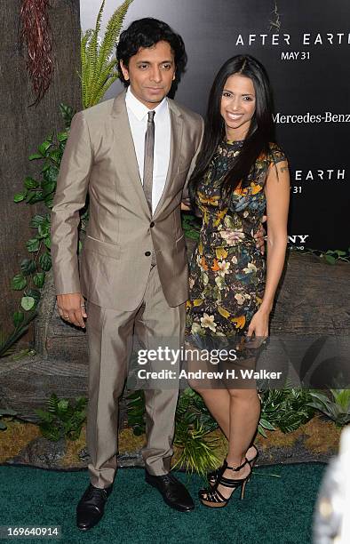 Director M. Night Shyamalan and Bhavna Vaswani attend the "After Earth" premiere at the Ziegfeld Theater on May 29, 2013 in New York City.