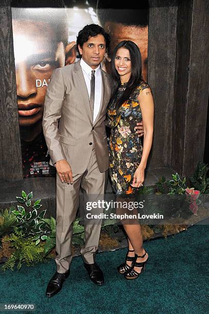 Director M. Night Shyamalan and Bhavna Vaswani attend the "After Earth" premiere at the Ziegfeld Theater on May 29, 2013 in New York City.