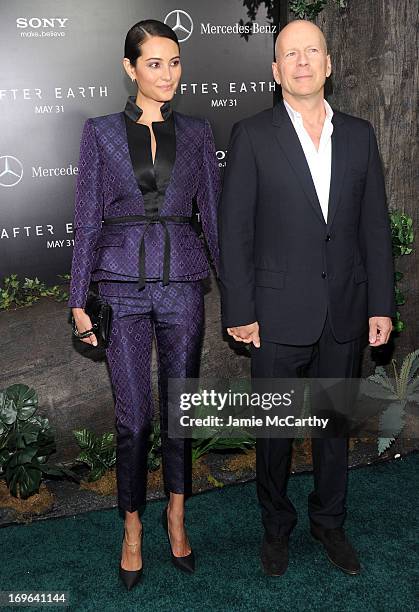 Emma Heming and Bruce Willis attend Columbia Pictures and Mercedes-Benz Present the US Red Carpet Premiere of AFTER EARTH at Ziegfeld Theatre on May...