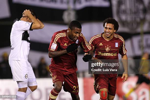 Rhayner and Wellington Nem of Fluminense celebrate a goal during a match between Olimpia and Fluminense as part of the Copa Bridgestone Libertadores...