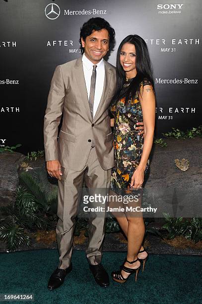 Director M. Night Shyamalan and Bhavna Vaswani attend Columbia Pictures and Mercedes-Benz Present the US Red Carpet Premiere of AFTER EARTH at...