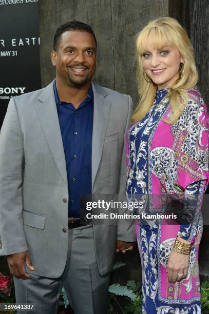 Alfonso Ribeiro and Angela Unkrich attend the "After Earth" premiere at Ziegfeld Theater on May 29, 2013 in New York City.