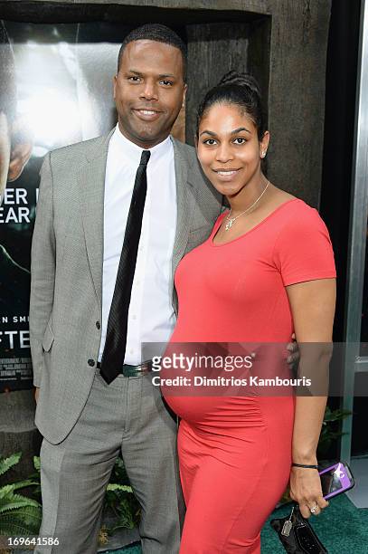 Television personality A. J. Calloway and Dionne Walker attend the "After Earth" premiere at the Ziegfeld Theater on May 29, 2013 in New York City.