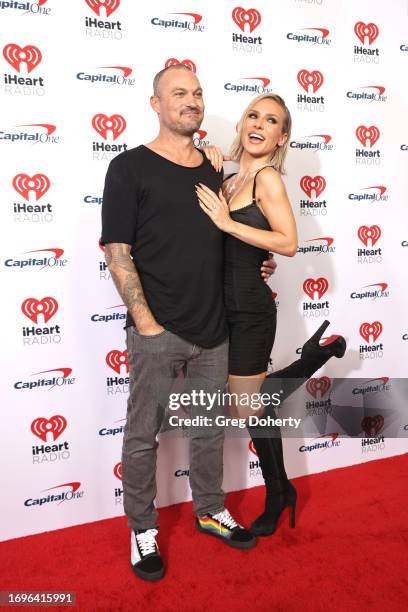 Brian Austin Green and Sharna Burgess attend the 2023 iHeartRadio Music Festival at T-Mobile Arena on September 22, 2023 in Las Vegas, Nevada.