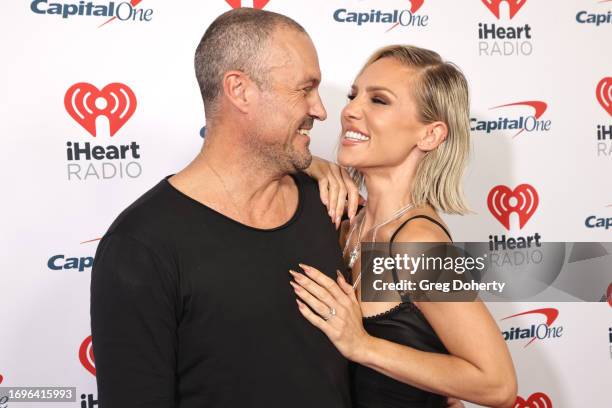 Brian Austin Green and Sharna Burgess attend the 2023 iHeartRadio Music Festival at T-Mobile Arena on September 22, 2023 in Las Vegas, Nevada.