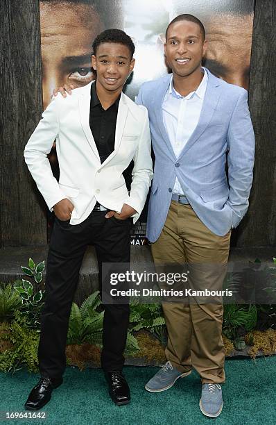 Darien Seaberry and Louis Stancil attend the "After Earth" premiere at the Ziegfeld Theater on May 29, 2013 in New York City.