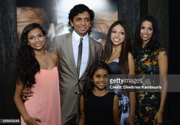 Director M. Night Shyamalan and Bhavna Vaswani attend the "After Earth" premiere at the Ziegfeld Theater on May 29, 2013 in New York City.