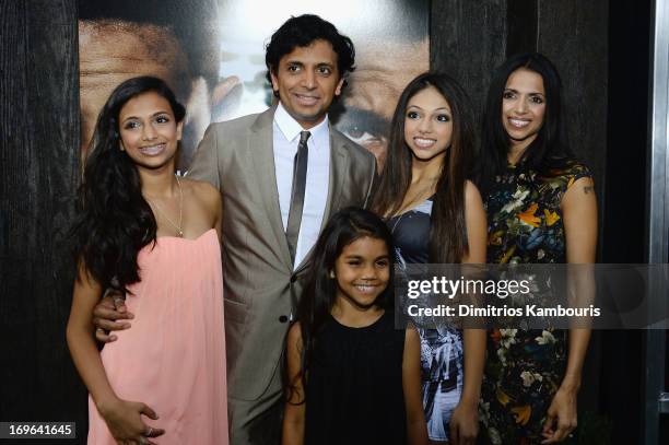 Director M. Night Shyamalan and Bhavna Vaswani attend the "After Earth" premiere at the Ziegfeld Theater on May 29, 2013 in New York City.