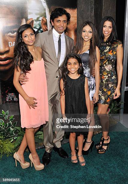 Director M. Night Shyamalan and Bhavna Vaswani attend the "After Earth" premiere at the Ziegfeld Theater on May 29, 2013 in New York City.