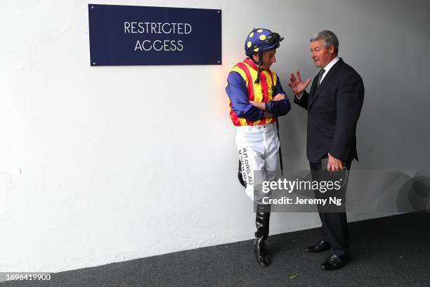 Ryan Moore riding Mr Waterville prepares with Darren Beadman for Race 3 Irresistible Pools and Spas during "Kia Golden Rose Day" - Sydney Racing at...