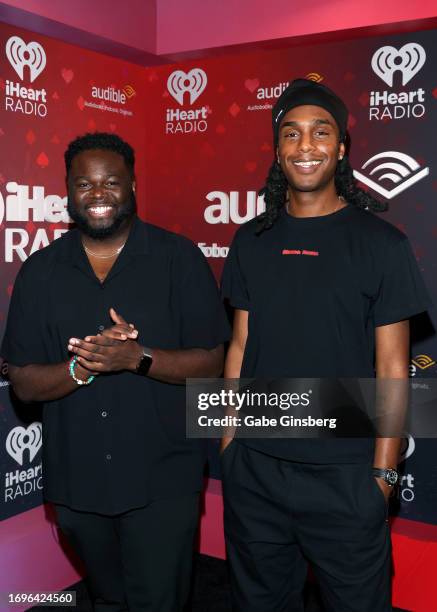 Edris "EJ" Jenkins and Bakar attend the 2023 iHeartRadio Music Festival at T-Mobile Arena on September 22, 2023 in Las Vegas, Nevada.