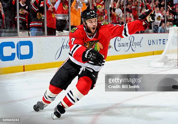 Brent Seabrook of the Chicago Blackhawks reacts after scoring the game-winning goal in overtime against the Detroit Red Wings to take the series in...