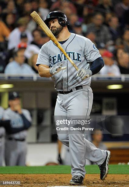 Kelly Shoppach of the Seattle Mariners reacts after striking out during the seventh inning of a baseball game against the San Diego Padres at Petco...