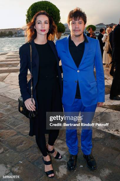 Adel Abdessemed and his wife Julie arrive at the Dinner At 'Fondazione Cini, Isola Di San Giorgio on May 29, 2013 in Venice, Italy.