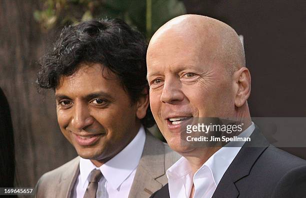 Director M. Night Shyamalan and actor Bruce Williis attend the "After Earth" premiere at the Ziegfeld Theater on May 29, 2013 in New York City.