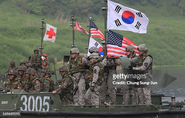 Soldiers from 2nd Battalion, 9th Infantry Regiment of the 1st Armored Brigade Combat Team of 2nd infantry division and South Korean soldiers from 6th...