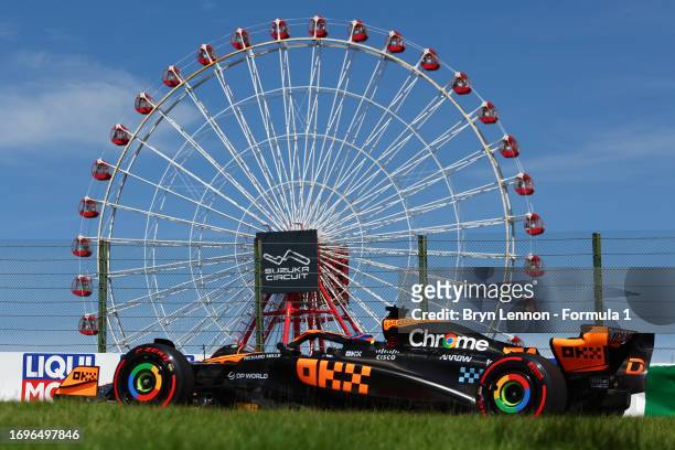 Oscar Piastri of Australia driving the McLaren MCL60 Mercedes on track during final practice ahead of the F1 Grand Prix of Japan at Suzuka...