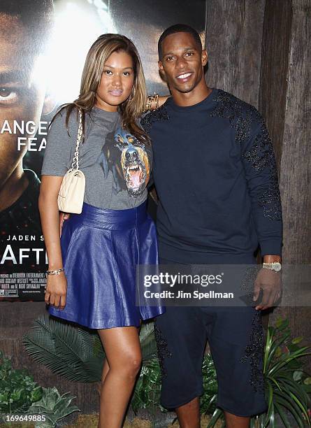 Victor Cruz and Elaina Watley attend the "After Earth" premiere at the Ziegfeld Theater on May 29, 2013 in New York City.
