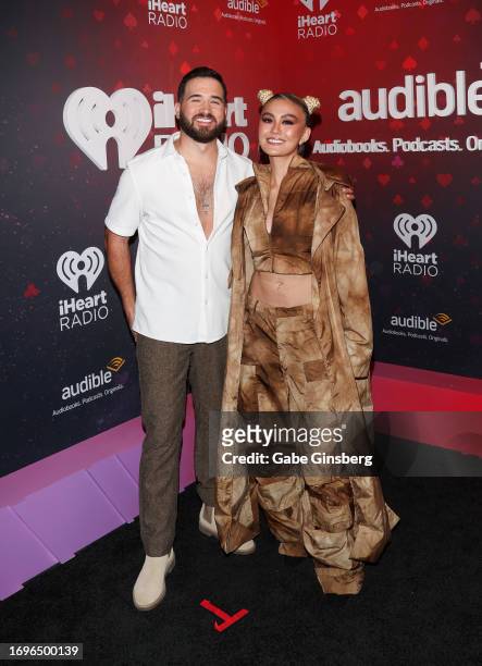 Mitch Clark and Agnez Mo attend the 2023 iHeartRadio Music Festival at T-Mobile Arena on September 22, 2023 in Las Vegas, Nevada.