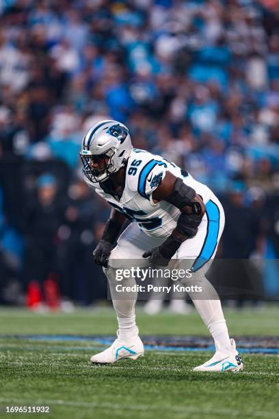 Derrick Brown of the Carolina Panthers looks on from the field during an NFL football game against the New Orleans Saints at Bank of America Stadium...