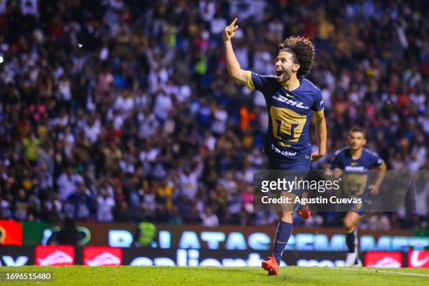 Cesar Huerta of Pumas celebrates after scoring the team's second goal during the 9th round match between Puebla and Pumas UNAM as part of the Torneo...