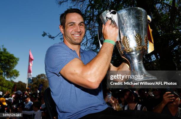 Josh Kennedy is seen with the Premiership cup during the 2023 AFL Grand Final Parade on September 29, 2023 in Melbourne, Australia.