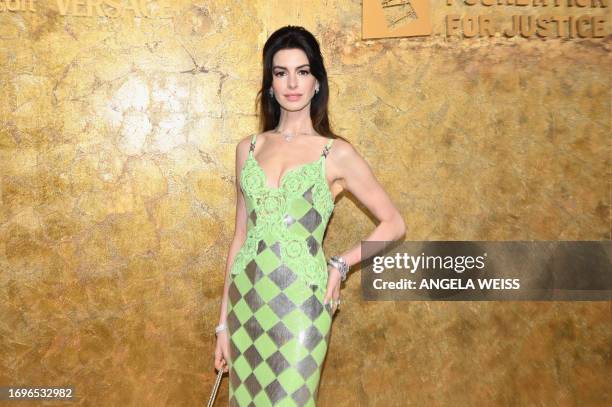 Actress Anne Hathaway arrives for The Albies hosted by the Clooney Foundation at the New York Public Library in New York City on September 28, 2023....