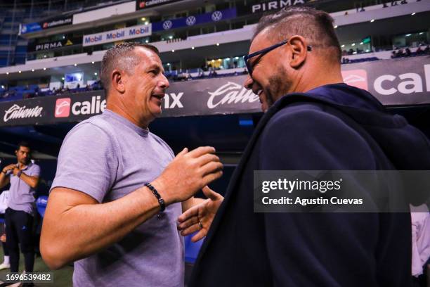 Ricardo Carbajal coach of Puebla and Antonio Mohamed coach of Pumas UNAM talk prior the 9th round match between Puebla and Pumas UNAM as part of the...