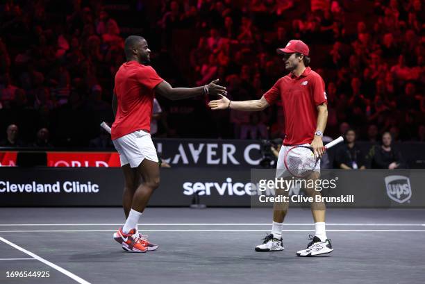 Tommy Paul of Team World reacts with his partner Frances Tiafoe of Team World in their match against Andrey Rublev of Team Europe and Arthur Fils of...