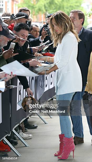 Jennifer Lopez signs autographs at BBC Radio One on May 30, 2013 in London, England.