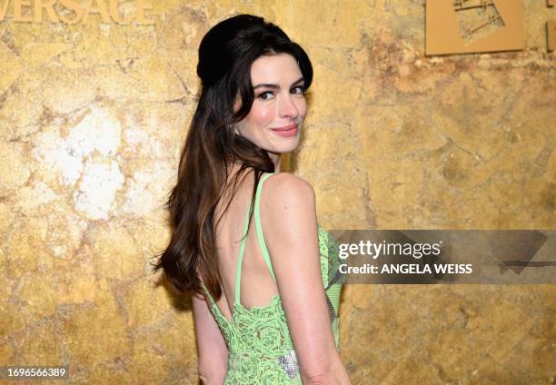 Actress Anne Hathaway arrives for The Albies hosted by the Clooney Foundation at the New York Public Library in New York City on September 28, 2023....