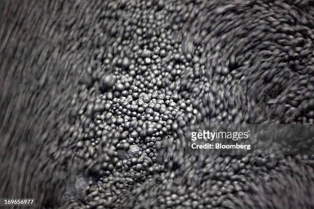 Iron ore pellets are seen during manufacture at the Lebedinsky GOK iron ore mining and processing plant, operated by Metalloinvest Holding Co., in...