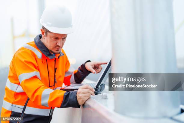 Engineer Inspecting Bridge 85 Bridge Inspection Engineer Stock Photos, High-Res Pictures, and ...