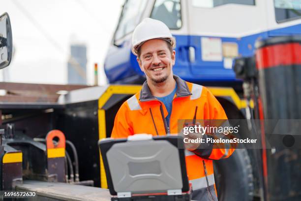 engineer working at site, operating work for mobile crane. - structural engineer stock pictures, royalty-free photos & images