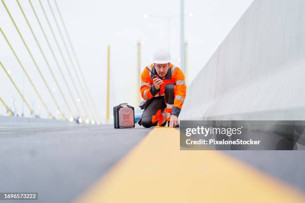 Engineer Inspecting Bridge 85 Bridge Inspection Engineer Stock Photos, High-Res Pictures, and ...