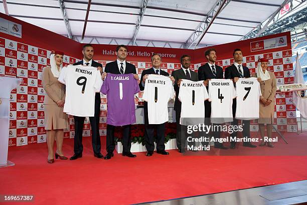 Real Madrid players, president Florentino Perez and Sheikh Ahmed bin Saeed Al Maktoum, Chairman of Emirates Airline, attend a press conference during...