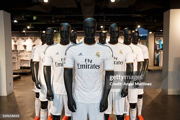 New Real Madrid kit is seen during a presentation to announce Emirates as the new sponsor for the 2013/14 season at Estadio Santiago Bernabeu on May...