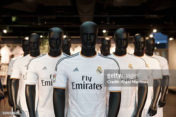 New Real Madrid kit is seen during a presentation to announce Emirates as the new sponsor for the 2013/14 season at Estadio Santiago Bernabeu on May...