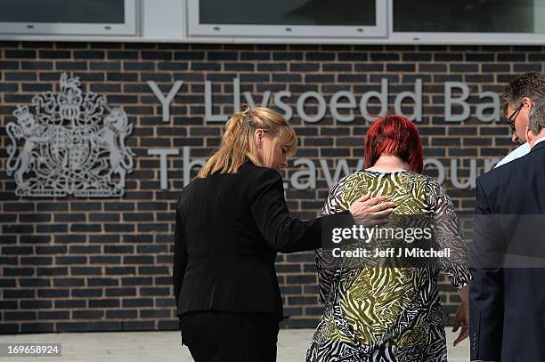 Paul and Coral Jones, the parents of April Jones, walk away after making a statement outside Mold Magistrates Court after Mark Bridger was found...