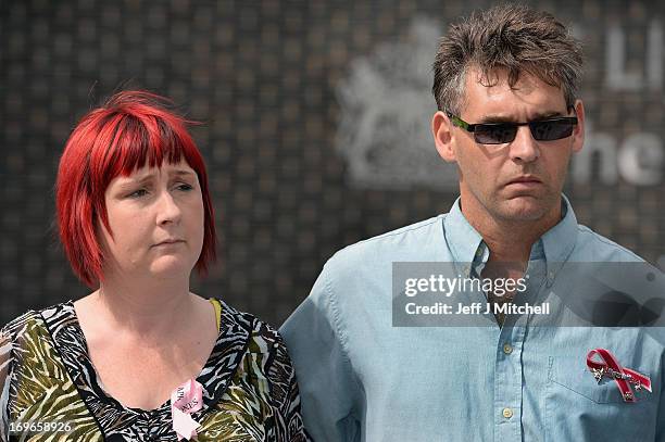 Paul and Coral Jones, the parents of April Jones, make a statement outside Mold Magistrates Court after Mark Bridger was found guilty of the murder...