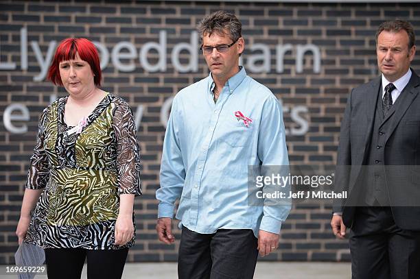 Paul and Coral Jones, the parents of April Jones, prepare to make a statement outside Mold Magistrates Court after Mark Bridger was found guilty of...