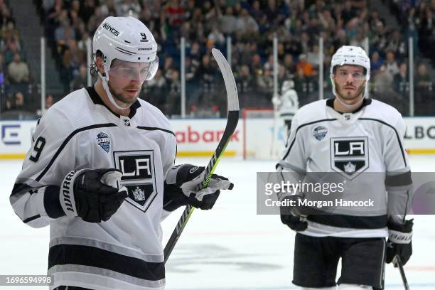 Adrian Kempe of the LA Kings signals in the style of an AFL goal umpire after scoring a goal during the NHL Global Series match between Arizona...