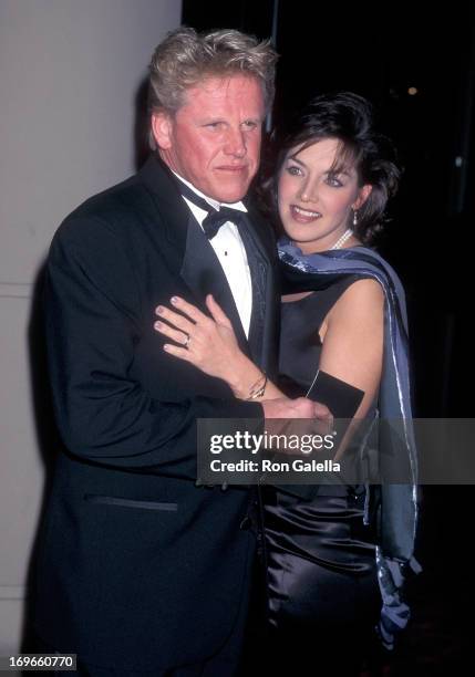 Actor Gary Busey and girlfriend Tiani Warden attend the 24th Annual American Film Institute Lifetime Achievement Award Salute to Clint Eastwood on...